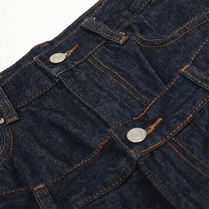 Flared jeans with distressed tassels