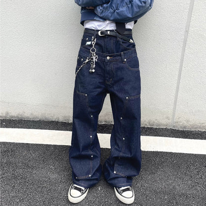 Flared jeans with distressed tassels