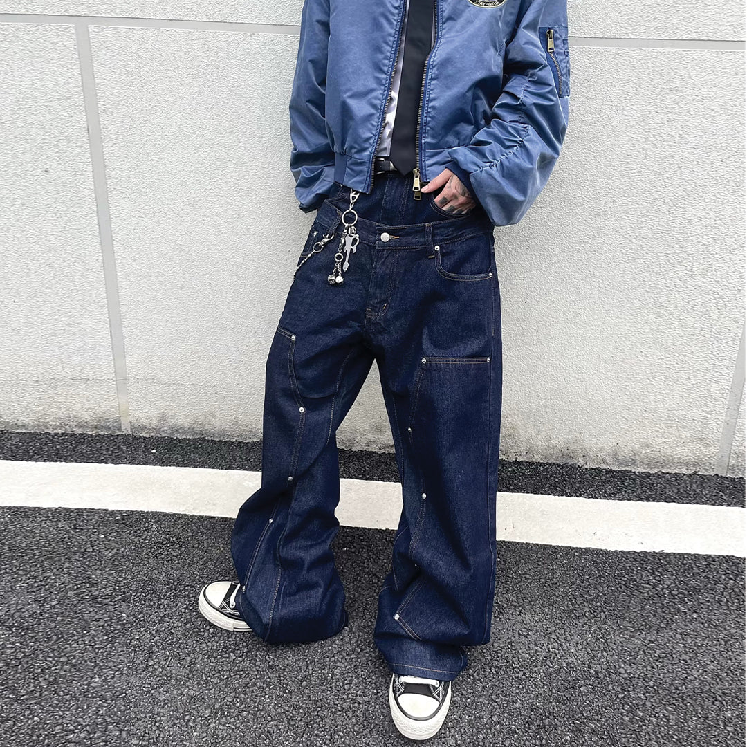 Flared jeans with distressed tassels