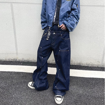 Flared jeans with distressed tassels