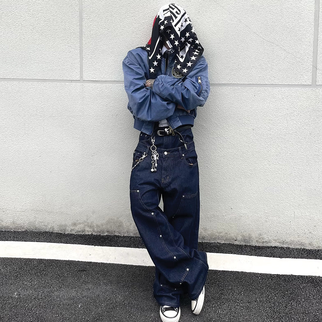 Flared jeans with distressed tassels